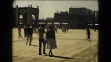 Mexico City (1962): People Walking Past Old Bridge