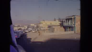 Los Angeles California USA (1962): Scene From A Car Slowly Driving By A Man On A