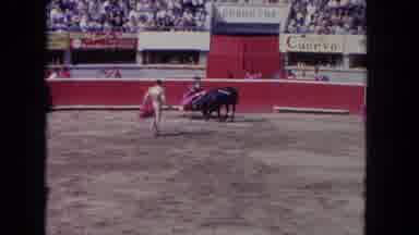 Los Angeles California USA-1962: Three Matadors Bullfighting in Outdoor Arena