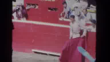 Los Angeles California USA (1962): A Man Holding A Red Cape And Wearing A Uniform