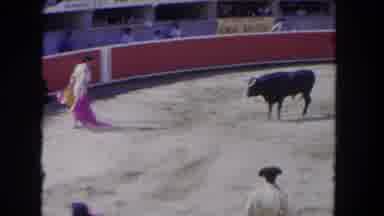 Los Angeles California USA-1962: A Matador With A Cape Taunts A Bull In A Bullfight