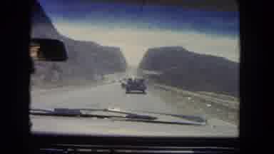 Los Angeles California USA (1962): A Person Driving Down The Highway For An