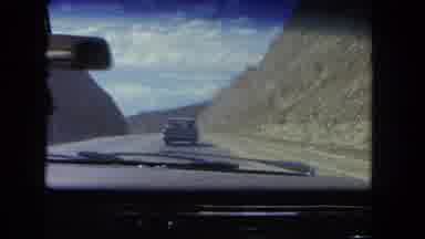 Los Angeles California USA (1962): The Car Running In The Road Slowly Because One