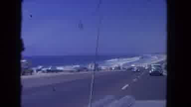Los Angeles California USA (1962): Driving Next To Water On A Road