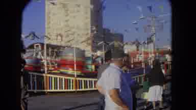 Los Angeles California USA (1962): People Stand Next To Tilt-A-Whirl Amusement