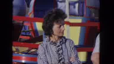 Los Angeles California USA (1962): People Standing Beside Amusement Park Ride On A