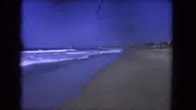 Los Angeles California USA-1962: Waves Lap The Shore Under The Blue Sky On The