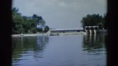 Illinois USA (1962): Person Wearing White Hat Sits In Boat On A Clear Day