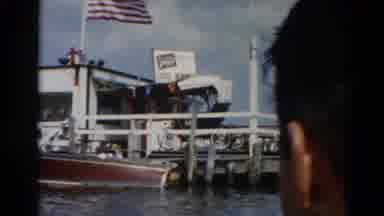 Illinois USA (1962): Ferry Carrying Old Time Car American Flag Blowing In The