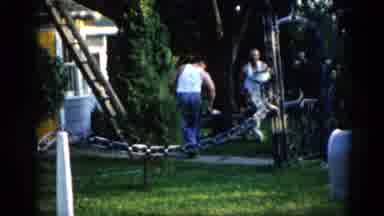 Illinois USA (1962): Two Men Prepare To Cut Down Large Tree On A Sunny Day
