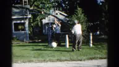 Illinois USA (1962): Two Neighbors Working On A Home Project For Removal Or
