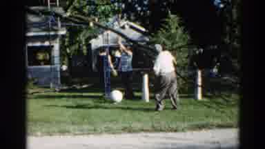 Illinois USA (1962): Two Men Working Together To Cut Down Parts Of A Tree