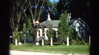 Illinois USA (1962): A Man Is Chopping Down A Tree Because The Tree Falls On Top