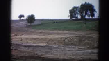 Illinois USA (1962): Sliding View Of The Countryside With A Couple Houses And