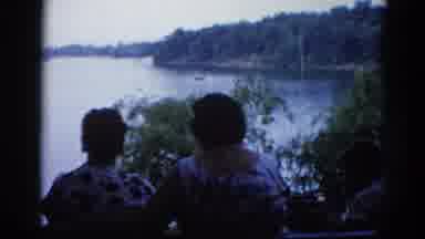 Illinois USA (1962): People Watching The Water On A Bench