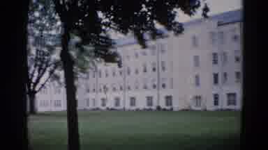 Illinois USA (1962): They Are Looking Around The Building Near The Mansion