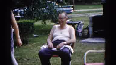 Illinois USA (1962): The Grandfather Sitting In The Chair And Some One Speak With