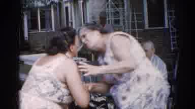 Illinois USA (1962): The Two Ladies Are Kissing In The Outside Of The Building