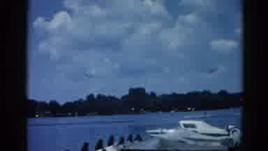 Illinois USA (1962): A Grain Belt Beer Sign A Lake Where People Are Boating Docks