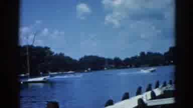Illinois USA (1962): There Is A Guy On The Water Ski Balancing Trying Not To Fall