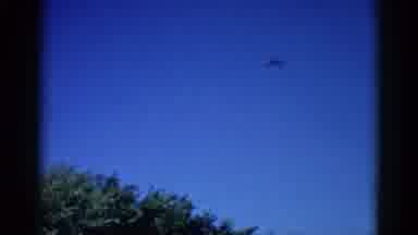 Illinois USA (1962): Big Passenger Airplane In The Great Blue Sky Gives Off A Very