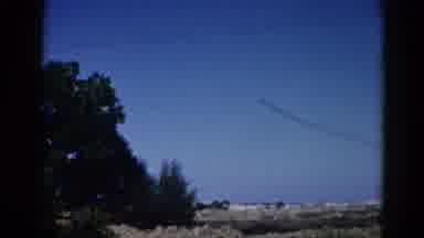 Illinois USA (1962): A Rocket In The Distance Flying Through The Sky During The