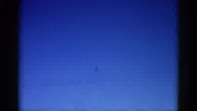 Illinois USA (1962): View Of Bright Blue Sky An Airplane Flies In The Air With