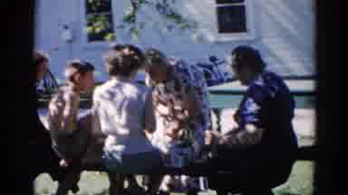 Illinois USA (1962): Grandmothers And Friend Having Picnic With Their Nephew In