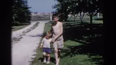 Illinois USA (1962): The Childrens Are Walking In The Garden They Are Enjoy