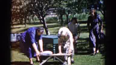 Illinois USA (1962): Elderly Woman Struggles To Find A Seat After A Long Day At