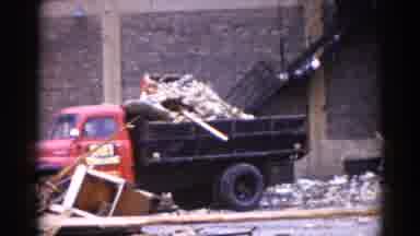 Illinois USA (1962): Building Being Demolished And The Crew Cleans Up The Debris