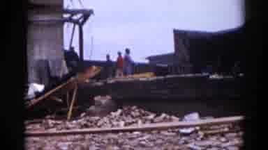 Illinois USA (1962): Brick Building People Walking Among Rubble Clearing Fallen