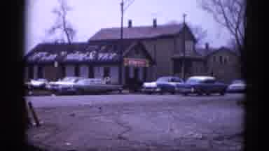 Illinois USA (1962): 50s Cars Driving Around Small Town And Parked In Neighborhood