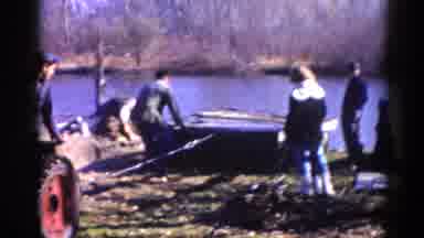 Illinois USA (1962): A Group Of Men Trying To Put A Dock In Using A Tractor