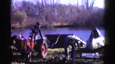 Illinois USA (1962): The Two Persons Are Doing To Create The Boat