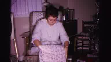 Hagerstown Maryland USA (1962): The Lady Is Doing To Take Some Box And Open