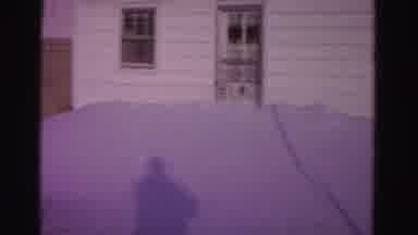 Hagerstown Maryland USA (1962): Person Filming Their House And Yard With Snow
