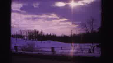 Hagerstown Maryland USA (1962): Person Skiing Down A Snowy Hill At Sunset