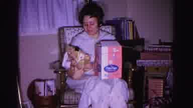 Hagerstown Maryland USA (1962): Woman Holding Her Christmas Gifts In A Rocking
