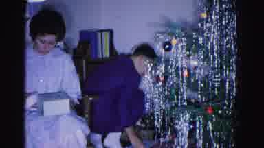 Hagerstown Maryland USA (1962): Christmas Morning With Mom And Son Son Is Passing
