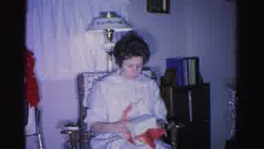 Hagerstown Maryland USA (1962): Woman Is Opening A Present And She Is Going To