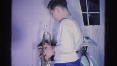 Hagerstown Maryland USA (1962): A Man Is Practicing The Musical Instrument With