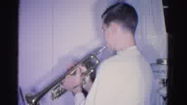 Hagerstown Maryland USA (1962): Young Man Playing A Song On His Trumpet By Reading