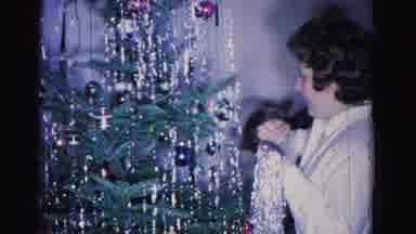 Hagerstown Maryland USA (1962): The Woman Who Is Decorating The Green Tree For