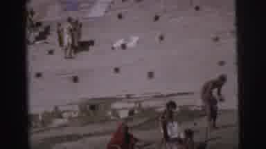 Calcutta India (1962): View Of Woman Washing A Child By A River On A Bright Sunny