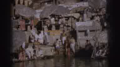 Calcutta India (1962): A Large Group Of People Bathing And Cleaning Laundry In A
