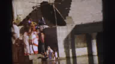 Calcutta India (1962): People On Steps In Large City Structures At Waterfront