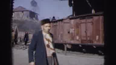 Calcutta India (1962): Old Train Passes By With One Person In A Hat On It And One