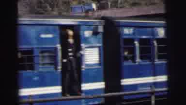 Calcutta India (1962): Blue Passenger Training Pulling Through The Station Full Of