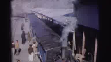 Calcutta India (1962): People On The Platform Enter The Train Before It Drives